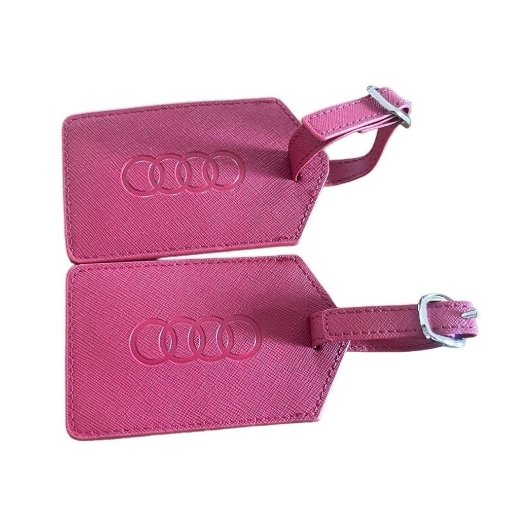 Audi 2 Red luggage tags.